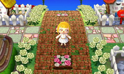 バラの花壇とレンガ道